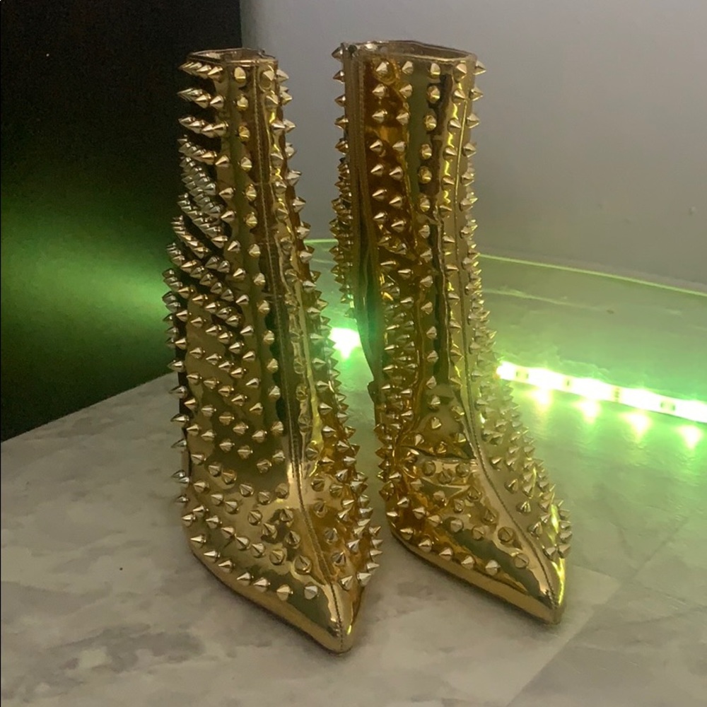 Gold spiked high heel boots